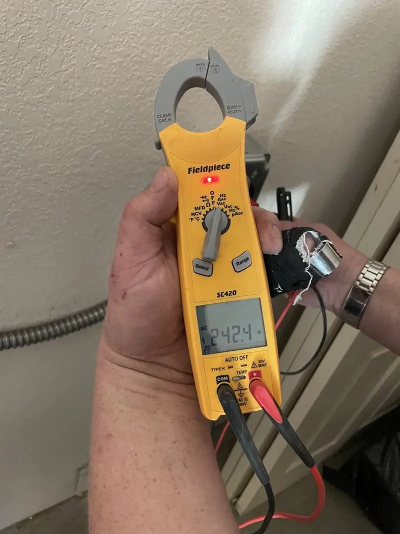 Voltage testing with clamp meter during Generator Installation in Lynwood